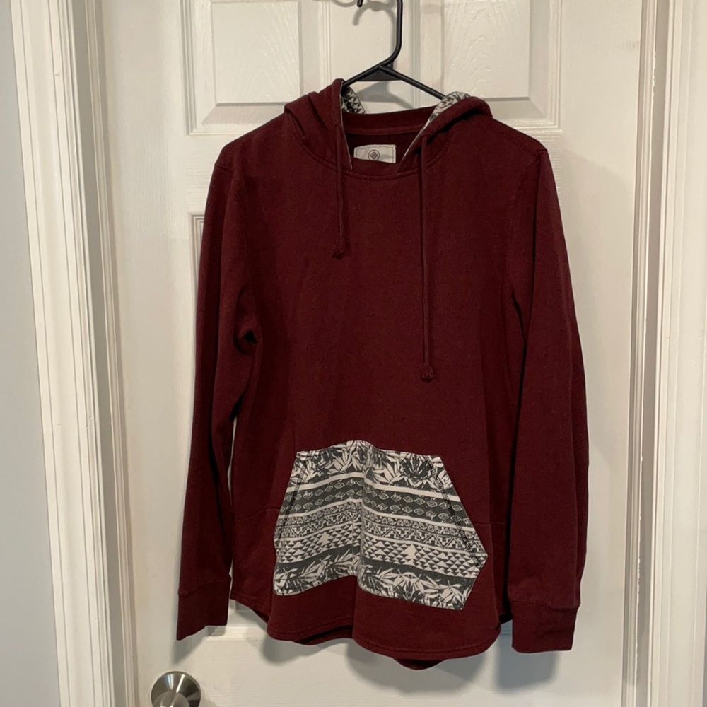 ON THE BYAS Burgandy graphic hoodie.